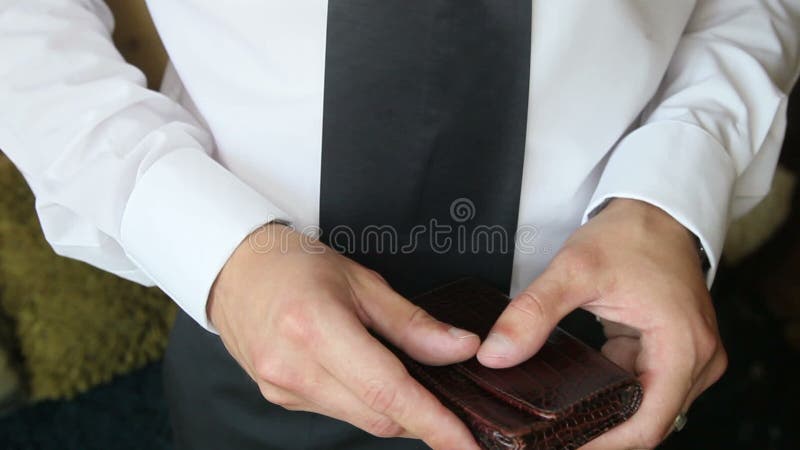 Man in suit and white shirt