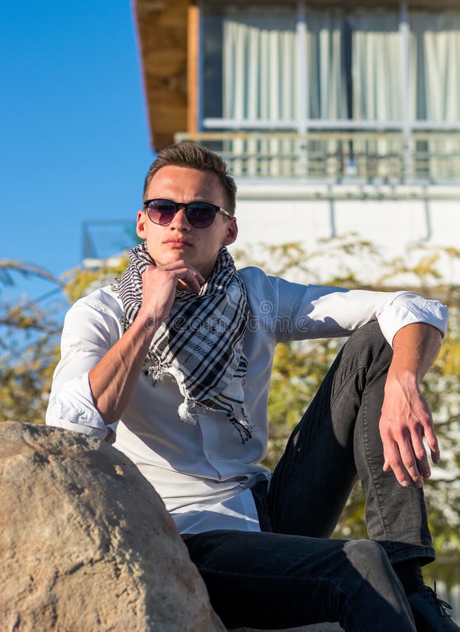 Man in Sunglasses and in a Shirt, in a Keffiyeh Stock Photo - Image of ...