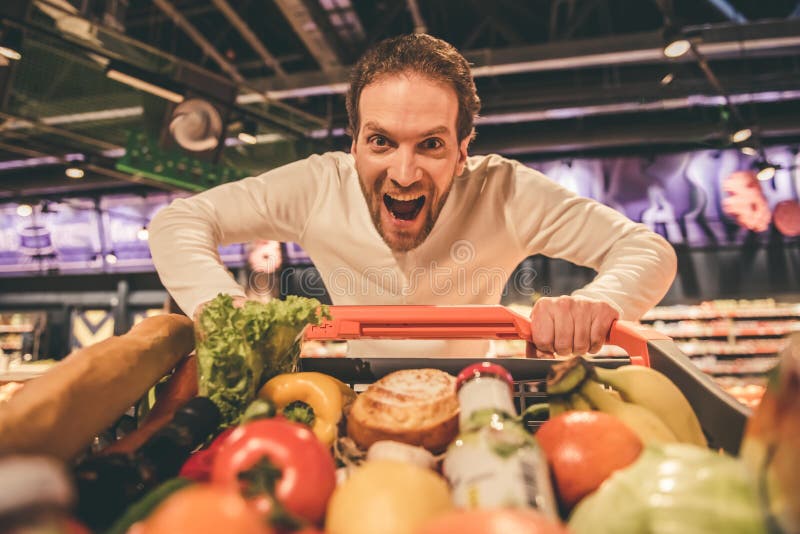 Man at the supermarket stock photos Man at the supermarket stock photos