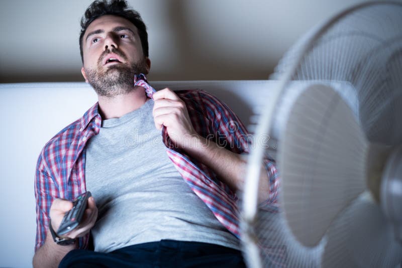 Man Sweating and Stressed during Summer Heat Stock Photo Image of