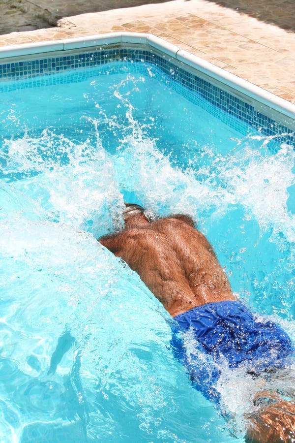 Man having fun in swimming pool. Man having fun in swimming pool.