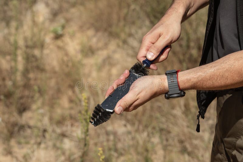 Man in Tactical Clothes Shooting from a Pistol, Reloading the Gun and Aiming at the Target in