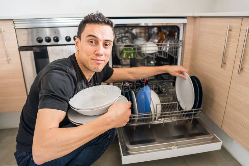 Man Taking Dishes Out of the Dishwasher Stock Photo Image of gopro