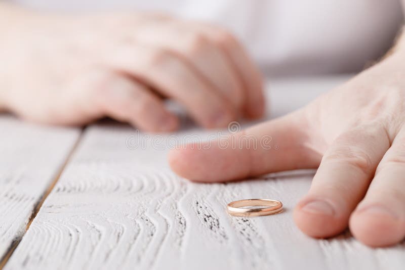 Man is Taking Off the Wedding Ring Stock Photo Image of divorcing