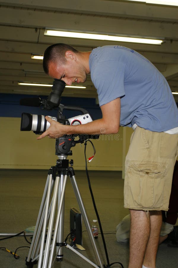 Man Taping with Video Camera Stock Image Image of camera, cameraman