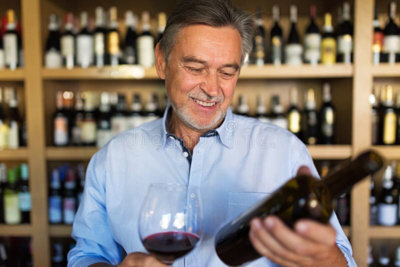 Man tasting wine stock image. Image of retail, sales 79241001