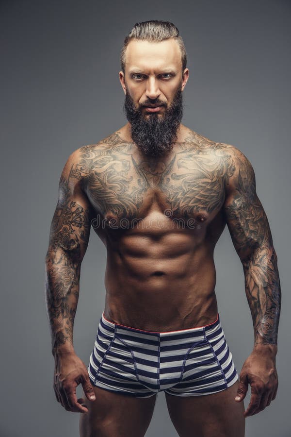 A Man with Tattooes on His Body. Stock Photo - Image of lifestyle