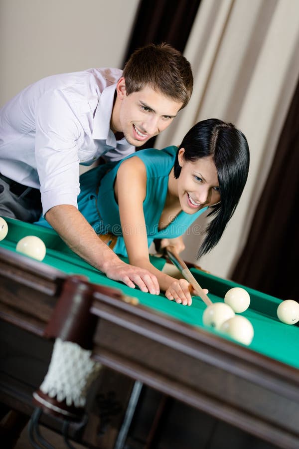 Man Teaching Woman To Play Billiards Stock Image Image of avocation