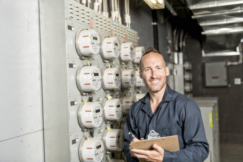 Man Technician Servicing at Work on Electric Room Stock Photo Image