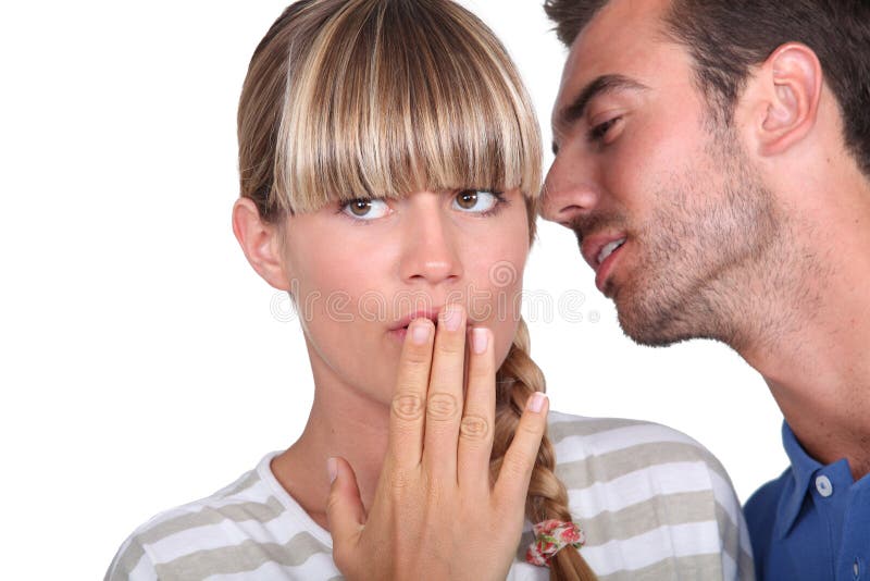 Man Whispering into a Woman S