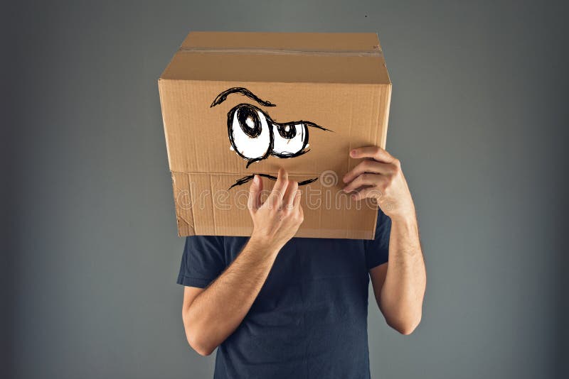 Man thinking with cardboard box on his head