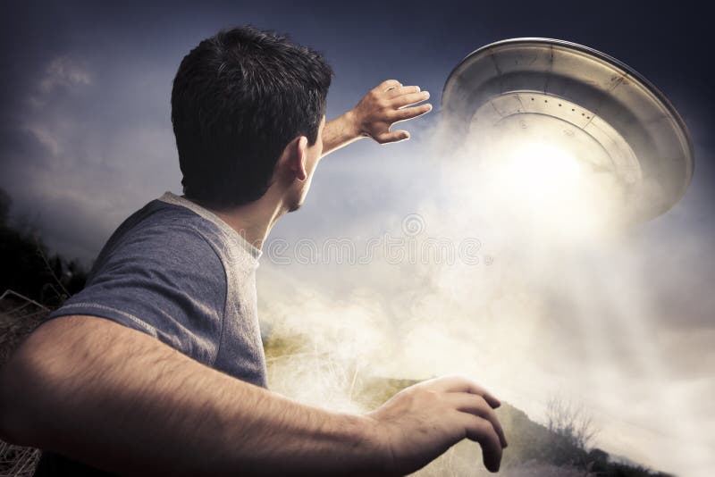 Man running away from a UFO. Man running away from a UFO