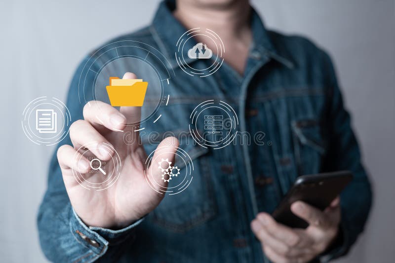 Man touch screen to manage data,Document Management System (DMS),knowledge and documentation in enterprise with ERP. royalty free stock photo