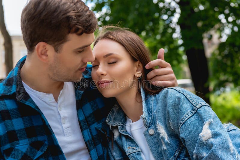 Man Touching Hair of Attractive Girlfriend Stock Photo - Image of ...