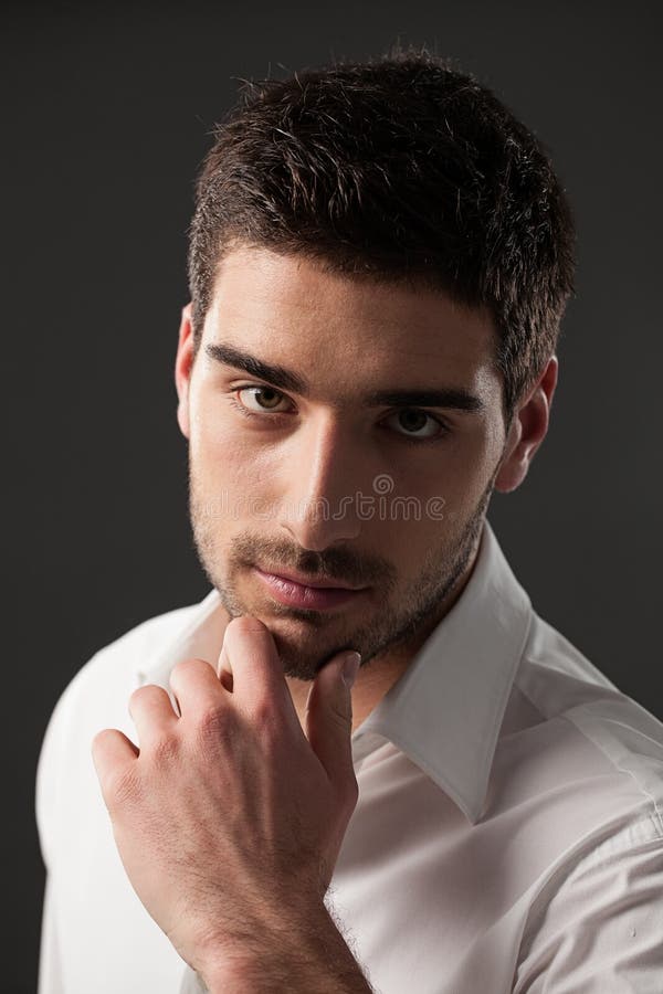 Man Touching His Chin stock image. Image of vertical - 34867401