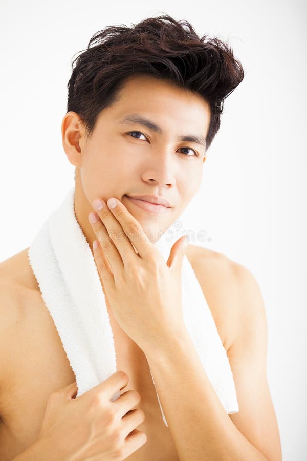 Man Touching His Smooth Face after Shaving Stock Photo Image of care