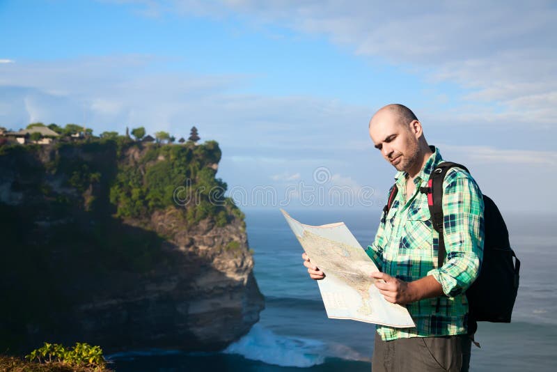 Man tourist with map