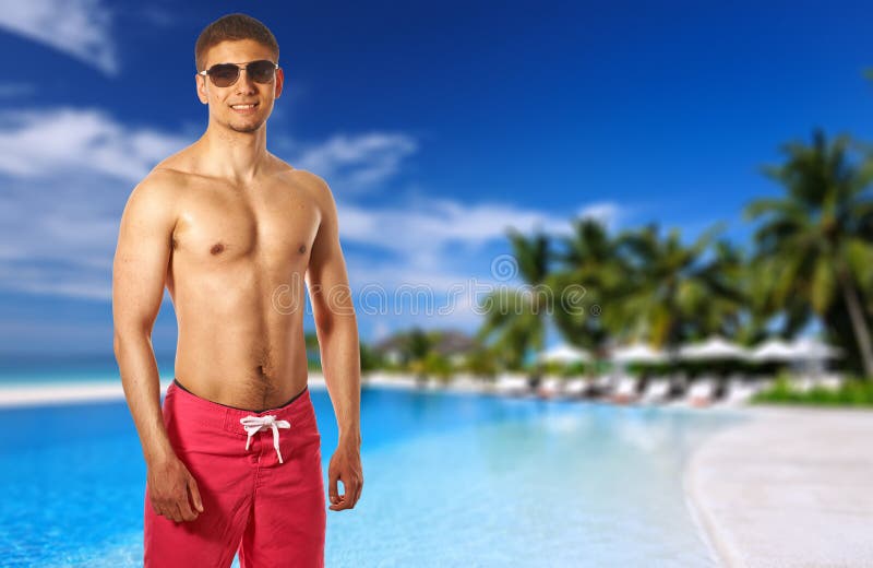 Man at Tropical Swimming Pool Stock Photo - Image of lifestyles, smile ...