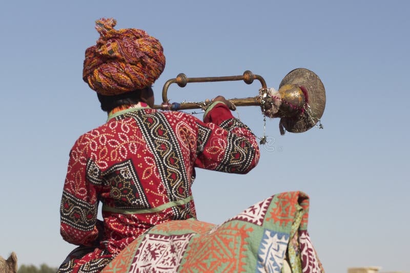 Man in Turban Blowing Trumpet