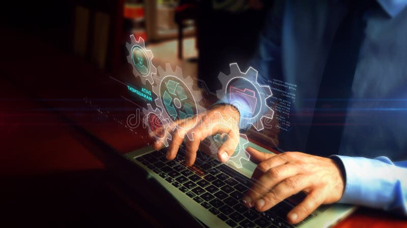 Man typing on keyboard with data management hologram stock images