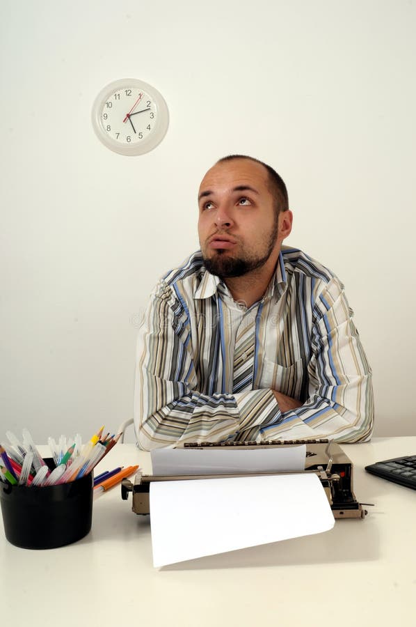 Man typing on Old Typewriter