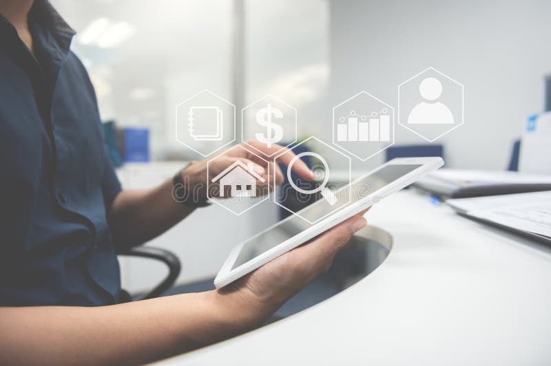 Man typing the tablet screen with business value diagram icon for online business concept stock photos