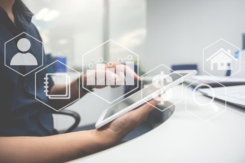 Man typing the tablet screen with business value diagram icon for online business concept stock photography