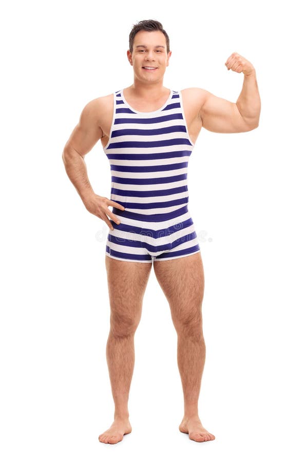 Full length portrait of a young man in a striped underwear flexing his left bicep isolated on white background. Full length portrait of a young man in a striped underwear flexing his left bicep isolated on white background