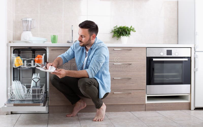 214 Man Loading Dishwasher Stock Photos Free & RoyaltyFree Stock Photos from Dreamstime