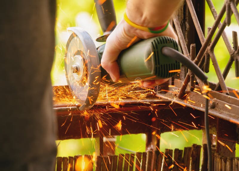 Man using angle grinder stock photography Man using angle grinder stock photography