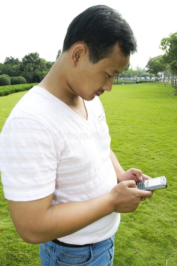 The man using cell phone