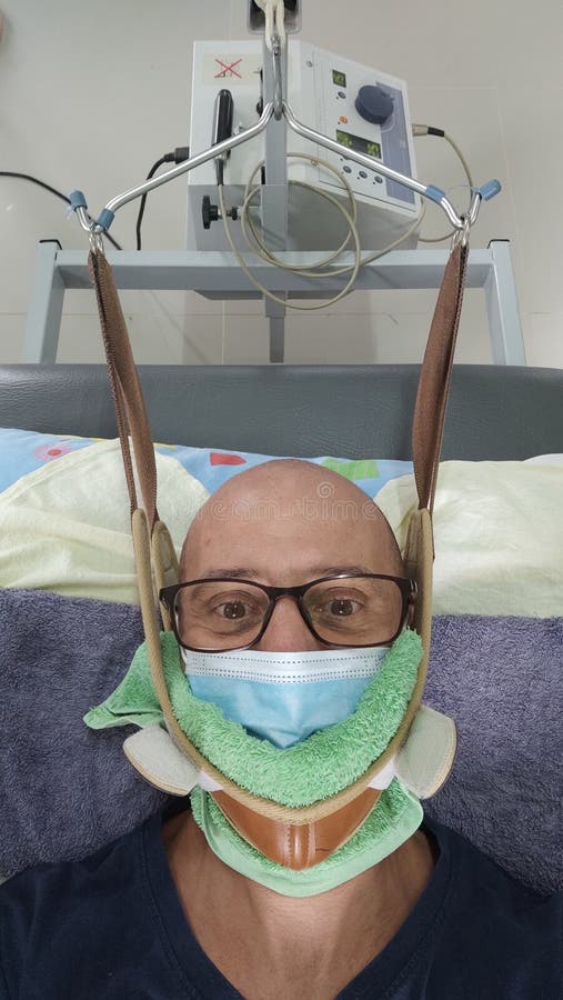 Man Using a Cervical Traction Device, Stretching the Neck and Cervical