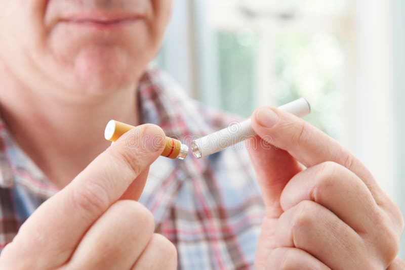 Man Using Electronic Cigarette To Stop Smoking Stock Photo Image of