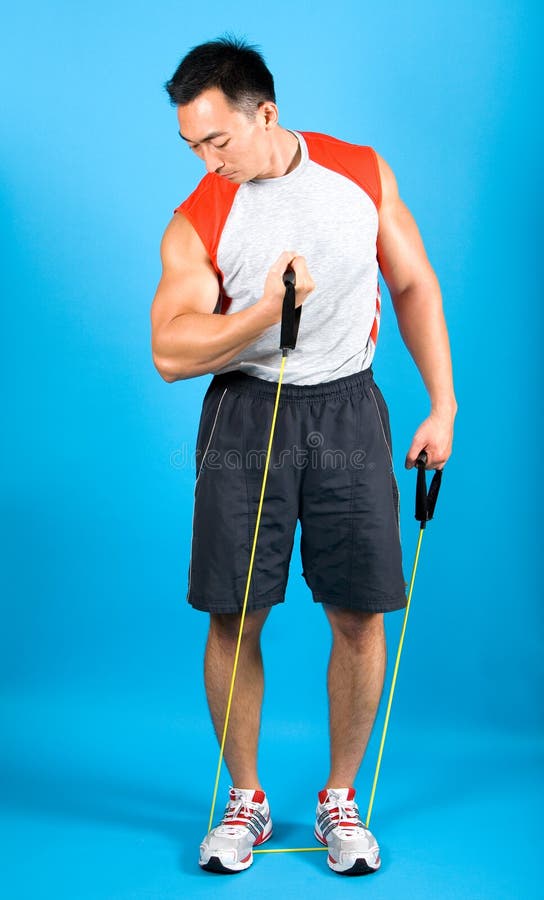 Man using exercise tubing to strengthen upper arm.