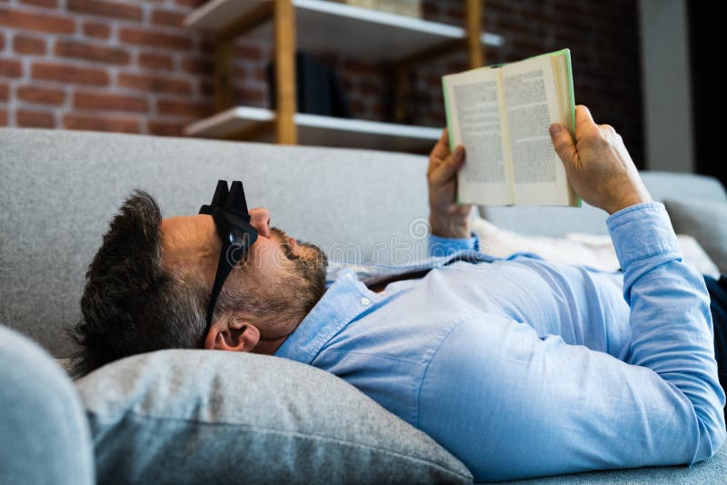 Man Using Lazy Reading Prism Glasses Stock Image Image of book
