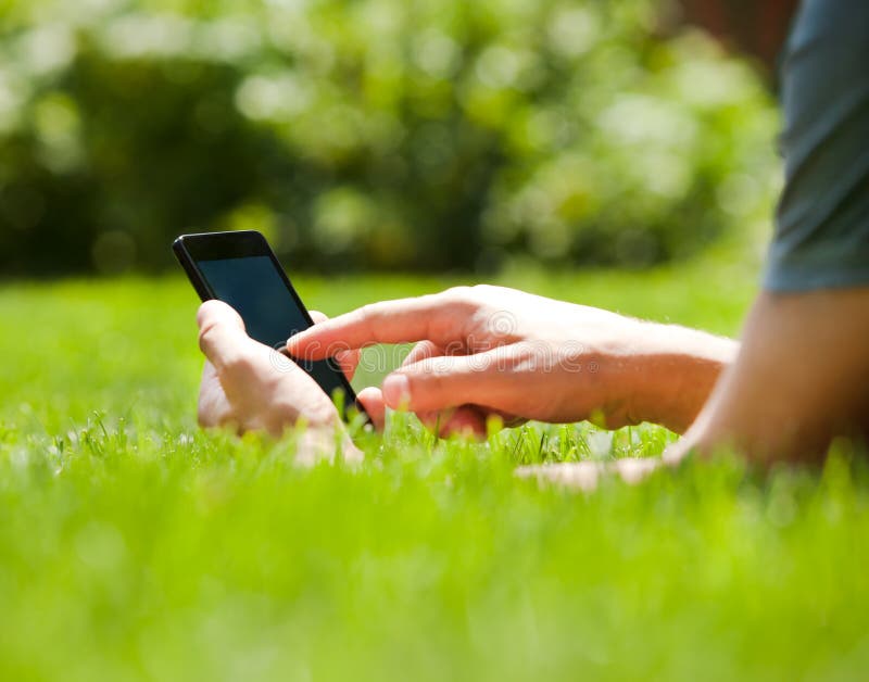 Man using mobile smart phone outdoor