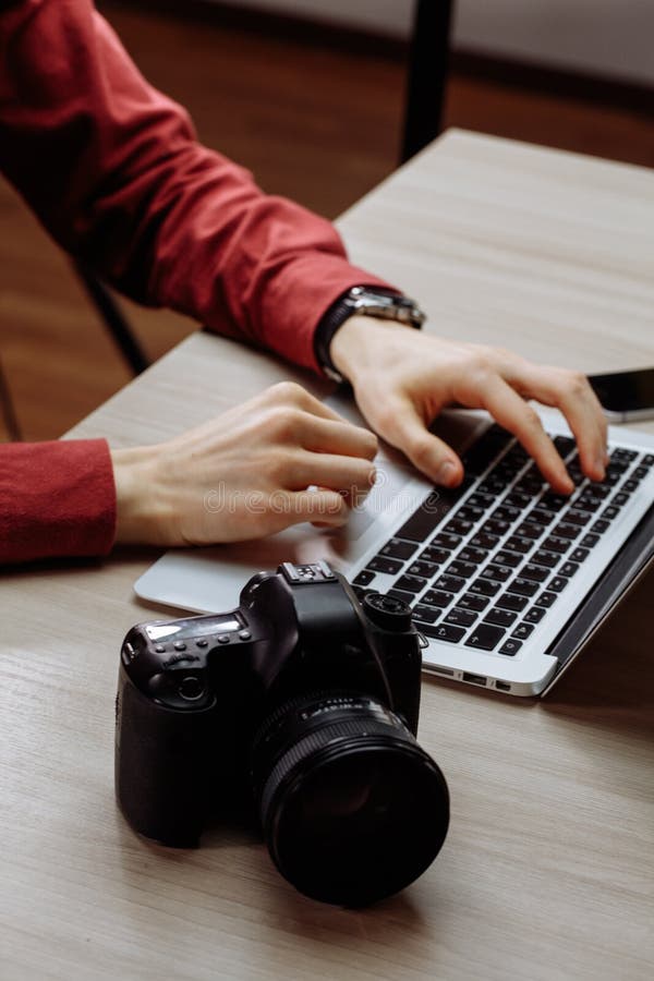 Man using new gadgets at work. close up side view cropped photo royalty free stock images Man using new gadgets at work. close up side view cropped photo royalty free stock images