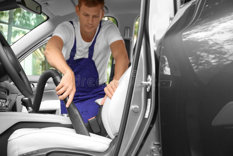 Man Using Vacuum Cleaner in Auto Stock Image Image of dusty, luxury