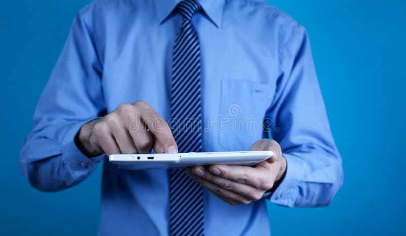 Man using white digital tablet. Technology royalty free stock photos Man using white digital tablet. Technology royalty free stock photos
