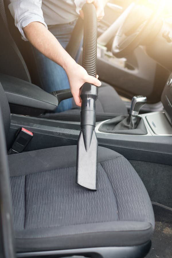 Man Vacuum Cleaning His Car Stock Photos Free & RoyaltyFree Stock