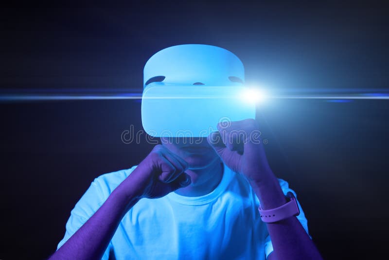 Man with Virtual Reality Headset is Playing Game and Fighting. Stock
