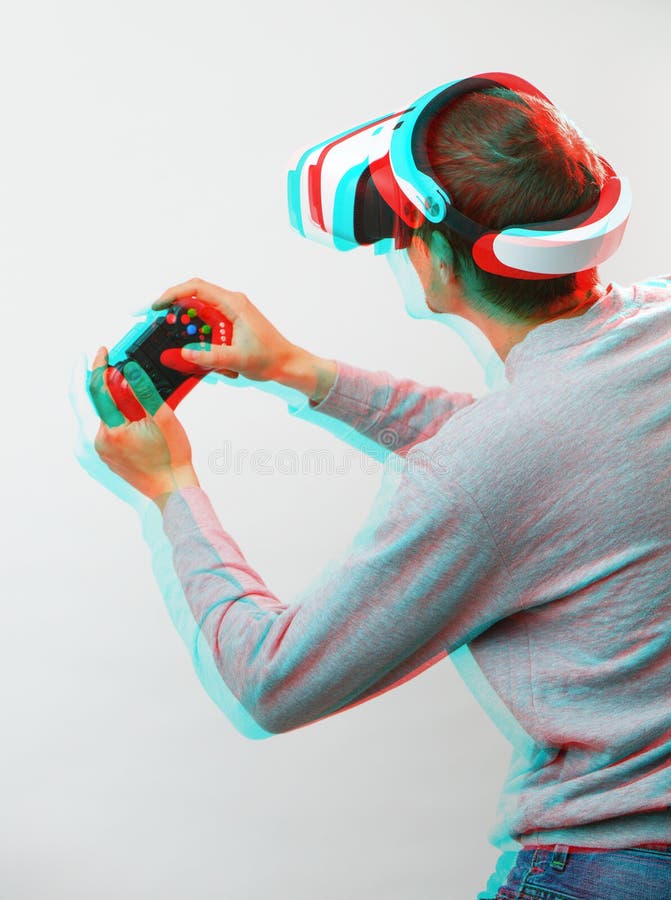 Man with virtual reality headset is playing game. Image with glitch effect. royalty free stock images