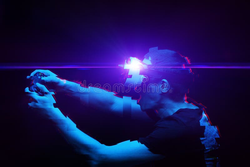 Man with virtual reality headset is playing game. Image with glitch effect. royalty free stock photography