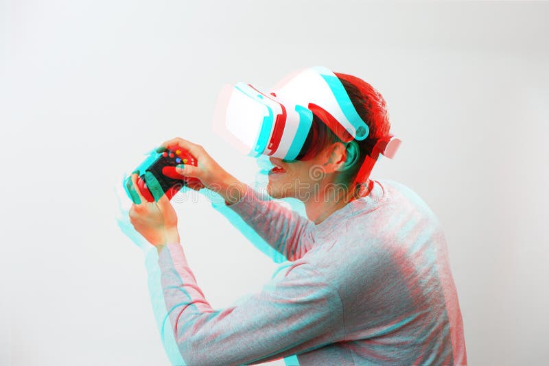 Man with virtual reality headset is playing game. Image with glitch effect. stock photo