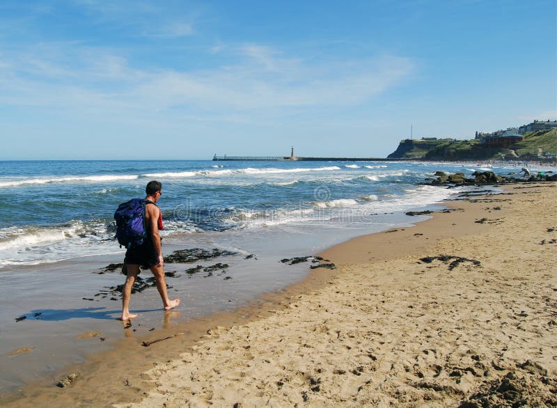 Man walking on beach