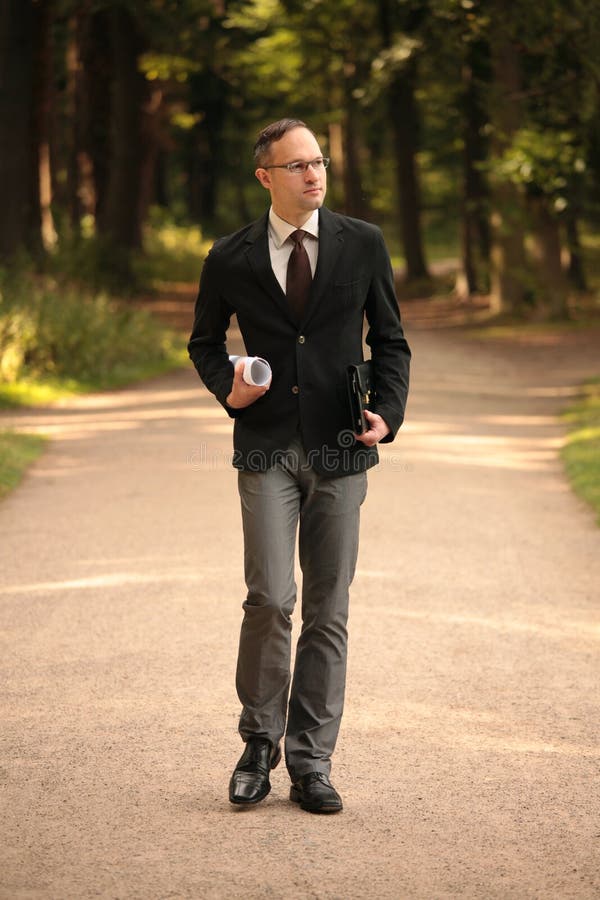 Man walking in city park