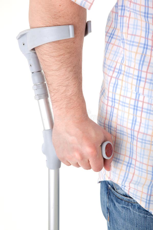Man walking with a crutch stock image. Image of hand, white 9229629