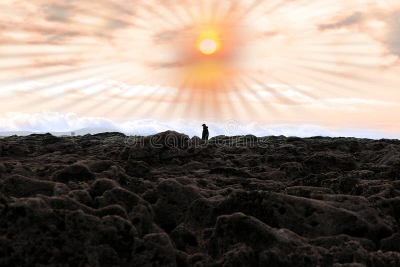 Man walking among rocks