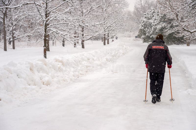 Man walking on snow stock photo. Image of beautiful, outdoor 83822468