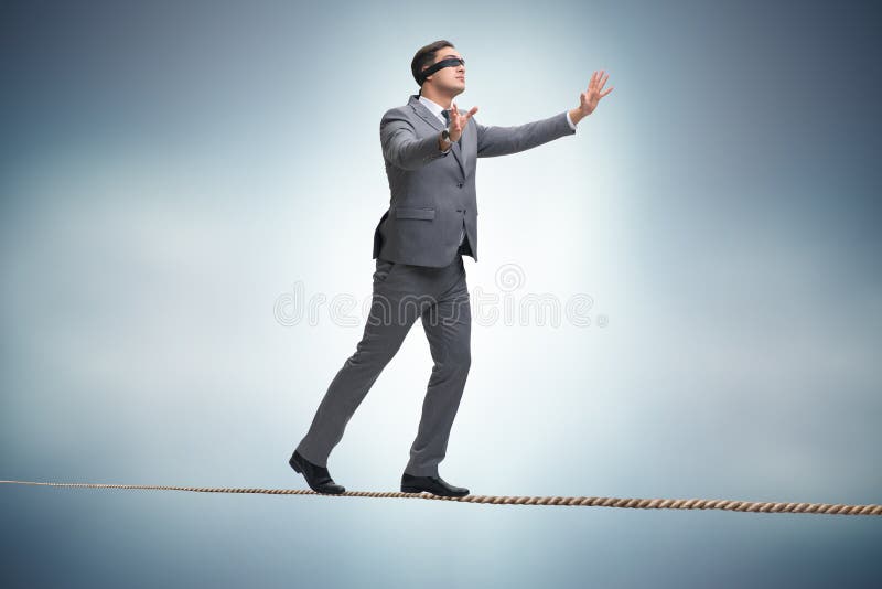 The Man Walking in Tight Rope Blindfold Stock Photo Image of courage